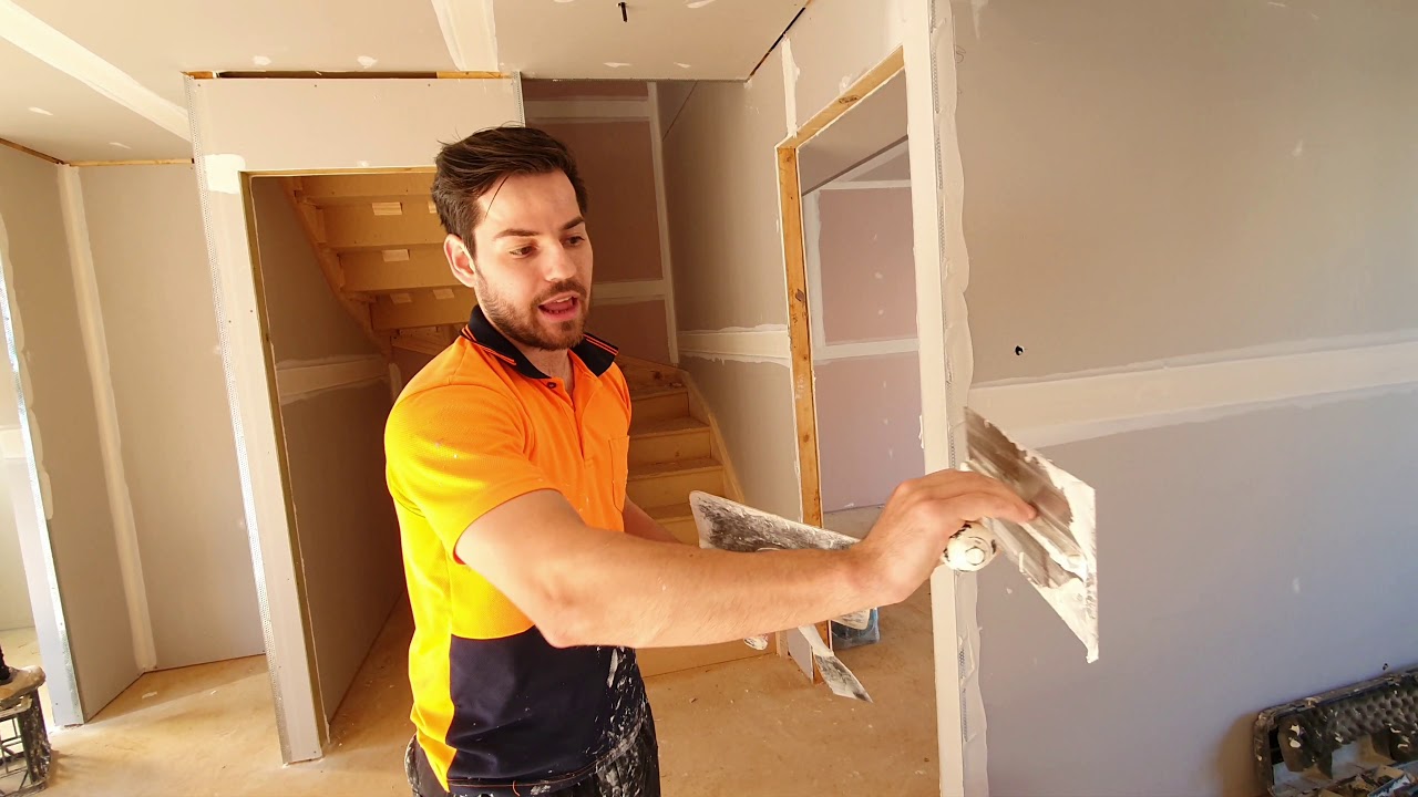 DRYWALL FINISHING HAWK & TROWEL BACKWARDS | Drywall Finishing Construction Series #10
